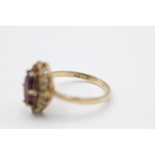 145 - 9ct gold vintage garnet dress ring 2.9 grams gross