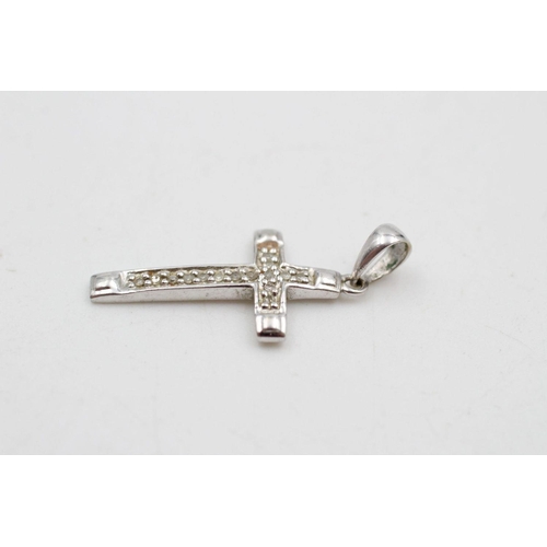 150 - 9ct White gold diamond detail cross pendant 1.5 grams gross