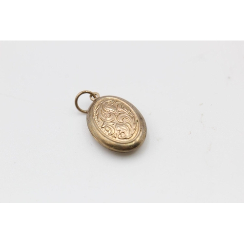 194 - 2 x 9ct gold patterned locket pendants 2.7 grams gross