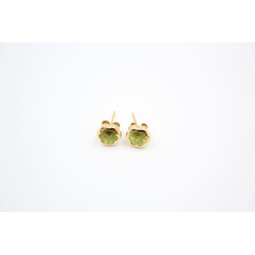 206 - 2 x 9ct gold gemstone stud earrings 1.6 grams gross