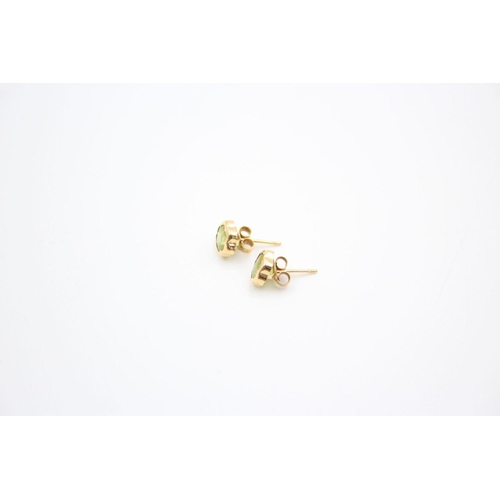 206 - 2 x 9ct gold gemstone stud earrings 1.6 grams gross