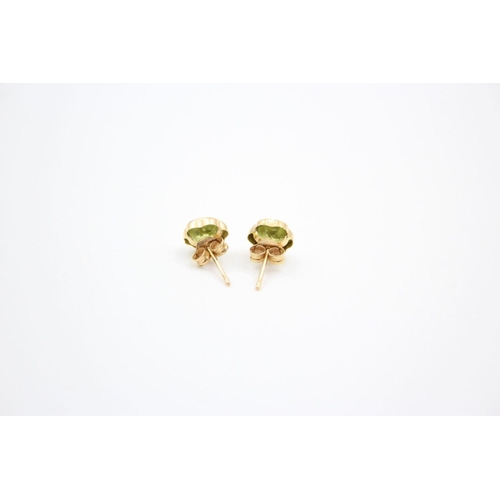 206 - 2 x 9ct gold gemstone stud earrings 1.6 grams gross