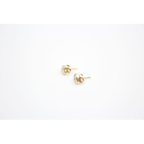 206 - 2 x 9ct gold gemstone stud earrings 1.6 grams gross