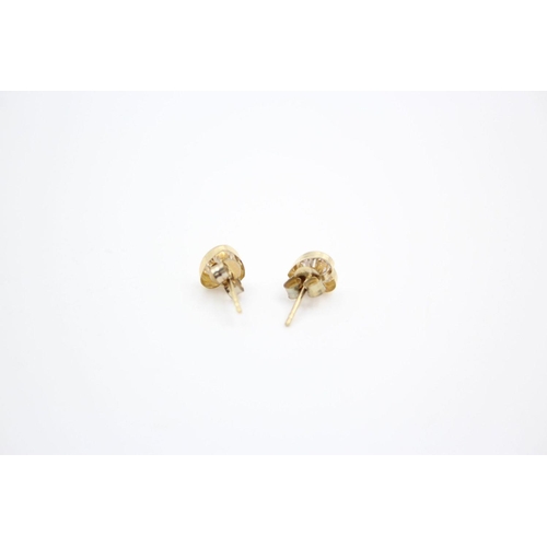 206 - 2 x 9ct gold gemstone stud earrings 1.6 grams gross