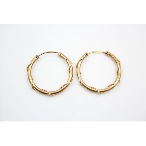 210 - 2 x 9ct gold rope wound hoop earrings 1.6 grams gross