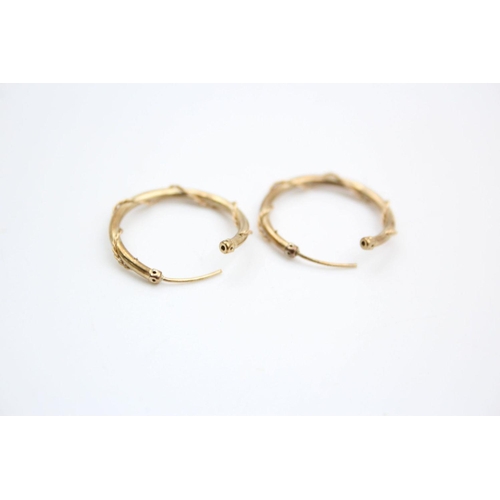 210 - 2 x 9ct gold rope wound hoop earrings 1.6 grams gross