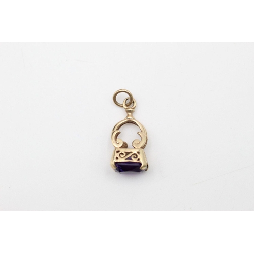 224 - 9ct Gold amethyst ornate fob pendant 2.1 grams gross