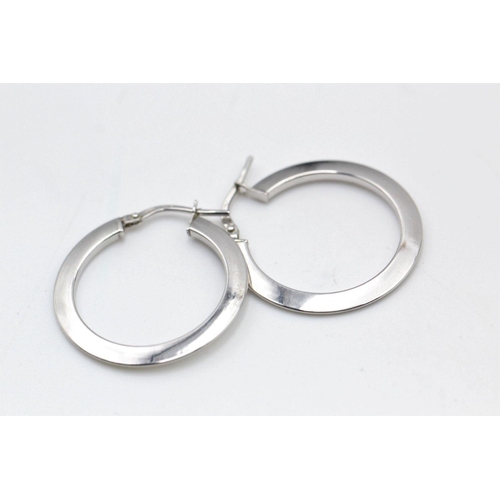 239 - 2 x 9ct white gold hoop earrings 2.5 grams gross