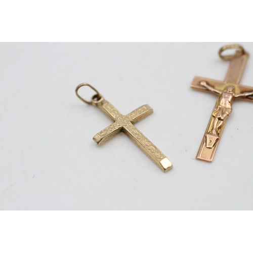 242 - 2 x 9ct gold crucifix and cross pendants 0.9 grams gross