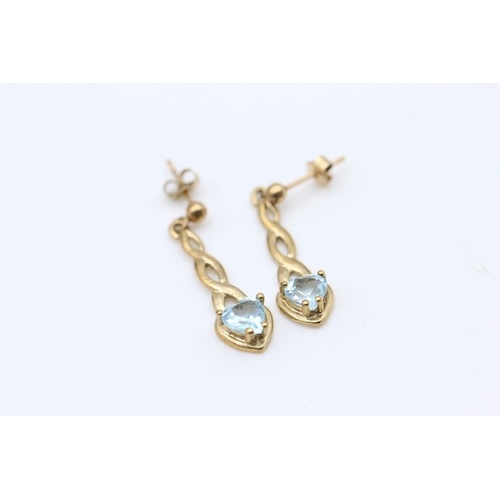 243 - 2 x 9ct gold topaz drop earrings 2.2 grams gross