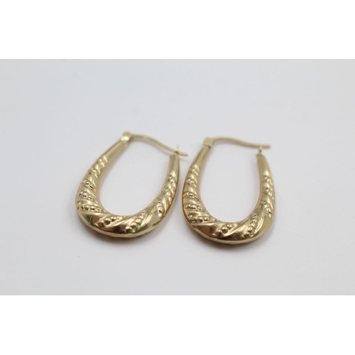 264 - 2 x patterned hoop earrings 3.6 grams gross