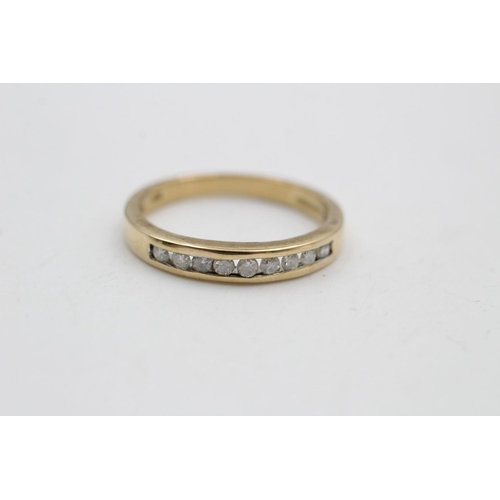 274 - 9ct gold diamond channel ring 2.5 grams gross