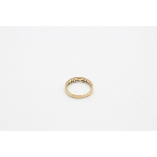 274 - 9ct gold diamond channel ring 2.5 grams gross