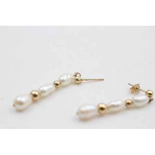 275 - 9ct gold pearl drop earrings 1.7 grams gross