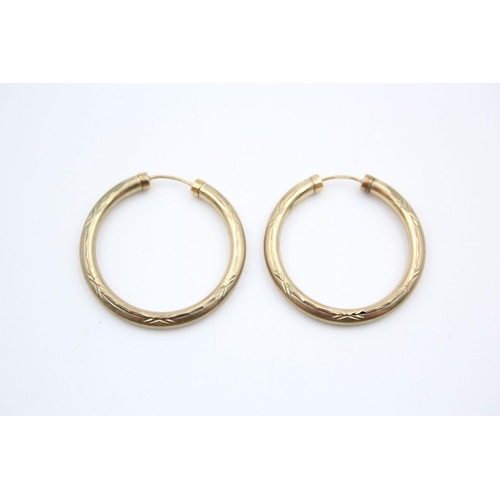 28 - 2 x 9ct gold hoop earrings 3.5 grams gross