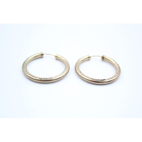 28 - 2 x 9ct gold hoop earrings 3.5 grams gross