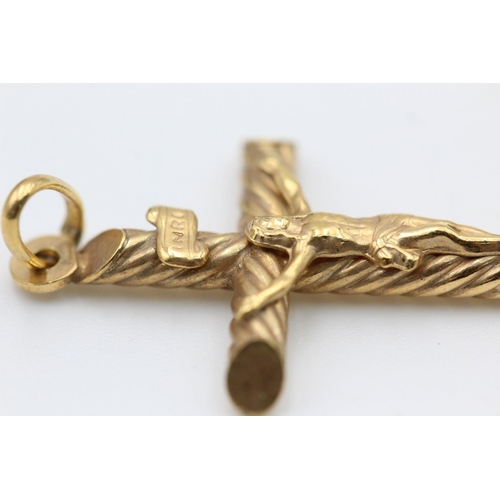 287 - 2 x 9ct gold crucifix pendants 3.7 grams gross