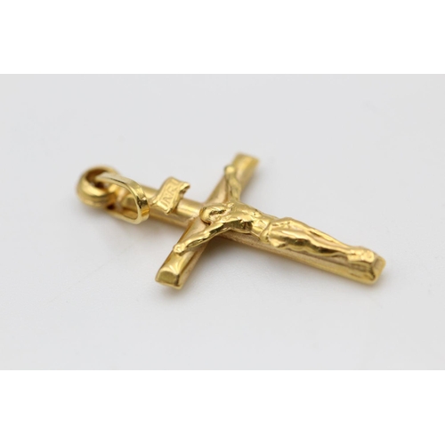 287 - 2 x 9ct gold crucifix pendants 3.7 grams gross