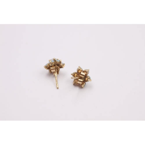 294 - 9ct Gold opal floral cluster stud earrings 1.3 grams gross