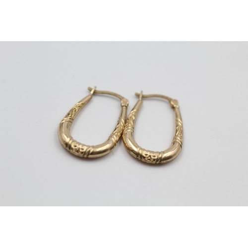 307 - 2 x 9ct gold hoop earrings 2 grams gross