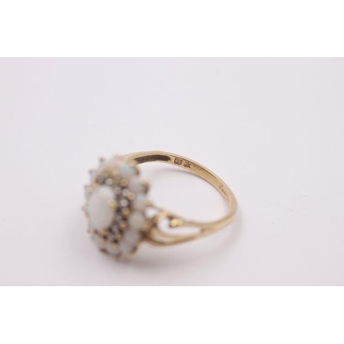 314 - 9ct gold opal & diamond cluster ring 2.7 grams gross