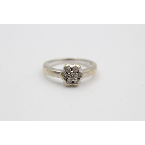 316 - 9ct White gold diamond cluster ring 3.9 grams gross