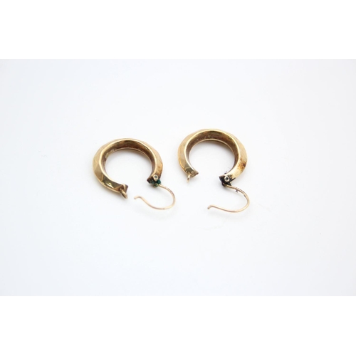 324 - 2 x 9ct gold hoop earrings 2.5 grams gross