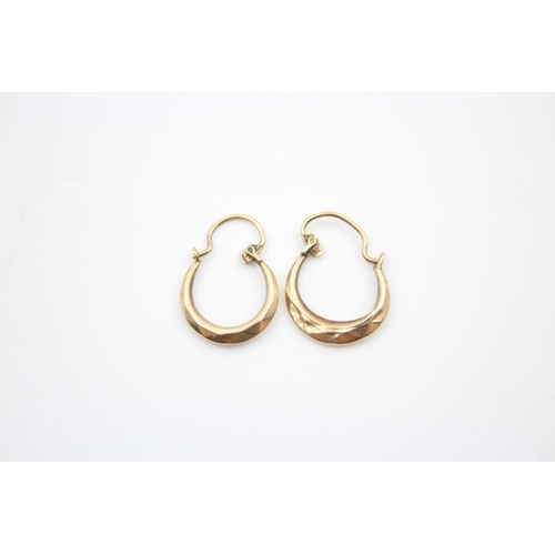 324 - 2 x 9ct gold hoop earrings 2.5 grams gross