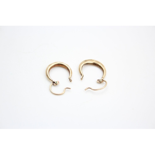 324 - 2 x 9ct gold hoop earrings 2.5 grams gross