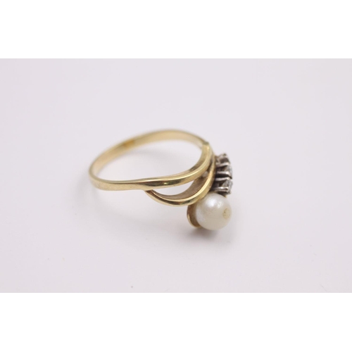 345 - 14ct gold diamond & pearl bypass ring, missing stone 3.4 grams gross