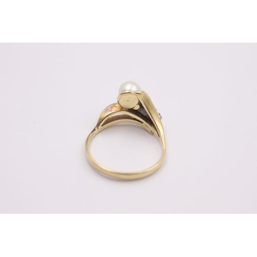 345 - 14ct gold diamond & pearl bypass ring, missing stone 3.4 grams gross