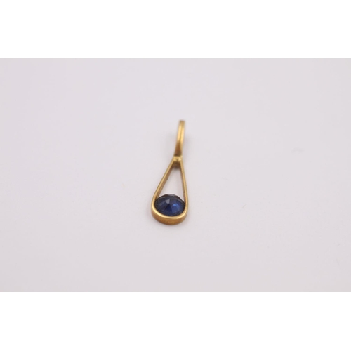 362 - 18ct Gold sapphire pendant 0.3 grams gross