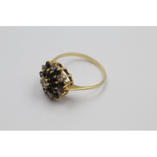 384 - 18ct Gold gemstone cluster ring 3.1 grams gross