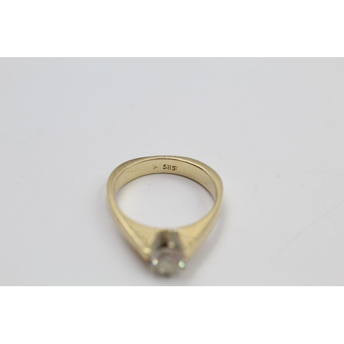 387 - 14ct gold modernist set gemstone solitaire ring 4.1 grams gross