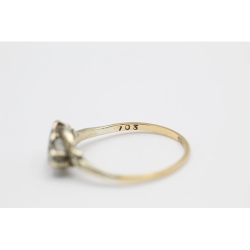 389 - 18ct gold diamond twist ring 1.9 grams gross