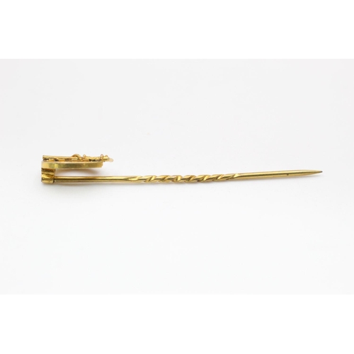 391 - 18ct gold antique horseshoe stick pin 1.5 grams gross