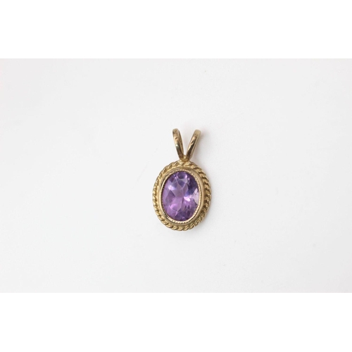 41 - 2 x 9ct gold amethyst pendants 1.5 grams gross