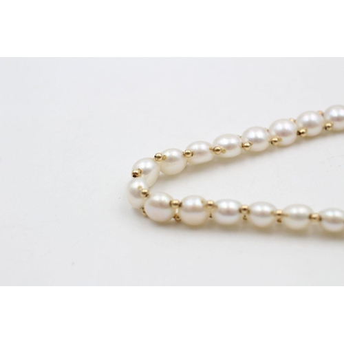 67 - 14ct gold and pearl bracelet 10 grams gross