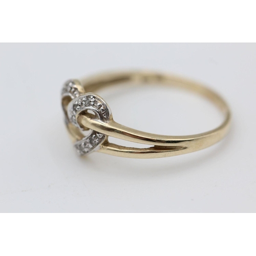 76 - 9ct Gold diamond detail heart ring 1.9 grams gross