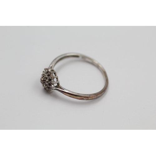 87 - 9ct White gold cluster ring 1.8 grams gross