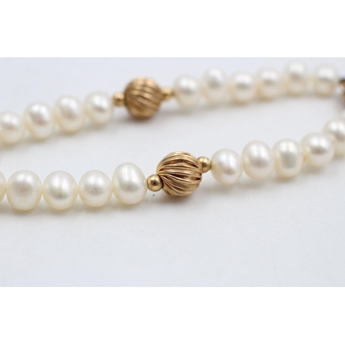 91 - 9ct gold pearls & etched beads bracelet 10.3 grams gross