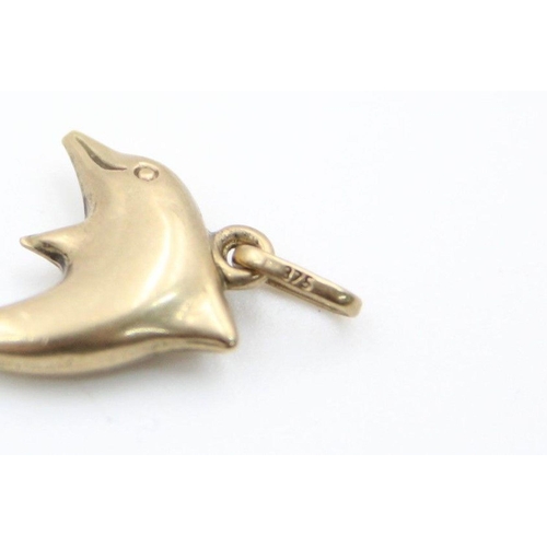 92 - 3 x 9ct gold dolphin and unicorn pendants 1.5 grams gross