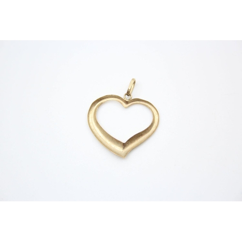 93 - 4 x 9ct gold heart pendants 2.4 grams gross