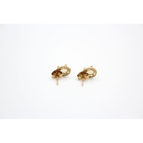 94 - 3 x 9ct gold gemstone earrings 1.9 grams gross