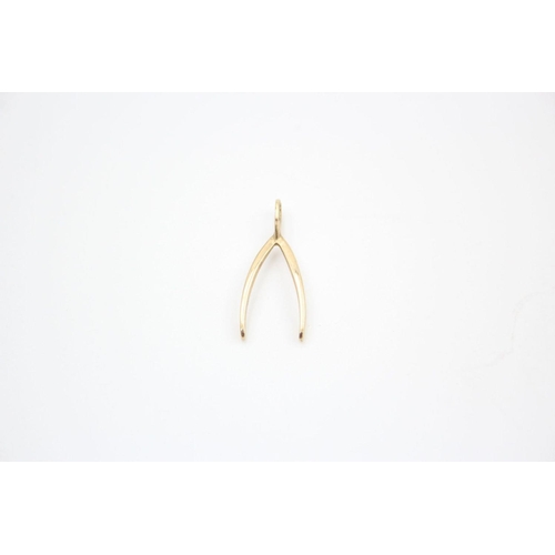 99 - 4 x 9ct gold gemstone pendants and wishbone pendant 3.5 grams gross