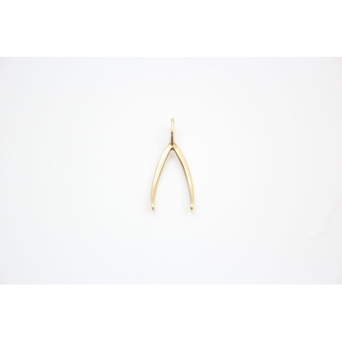 99 - 4 x 9ct gold gemstone pendants and wishbone pendant 3.5 grams gross