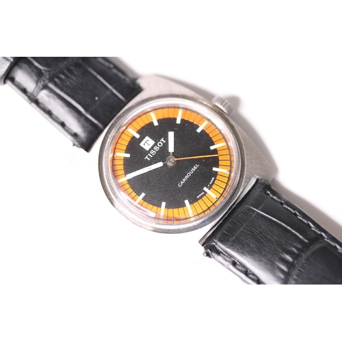 39 - VINTAGE TISSOT CARROUSEL WRIST WATCH, circular black dial with orange outer minutes track, white han... 