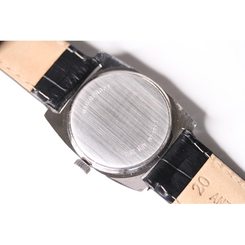 39 - VINTAGE TISSOT CARROUSEL WRIST WATCH, circular black dial with orange outer minutes track, white han... 