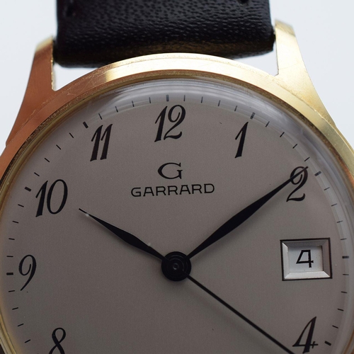 202 - GENTLEMAN'S GARRARD, 9CT GOLD, REF. 770756, NOVEMBER 1991, 33.5MM, BOX AND PAPERS circular cream dia... 