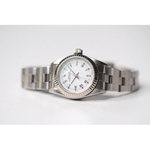 24 - LADIES ROLEX OYSTER PERPETUAL 18CT FLUTED BEZEL, circular white dial with roman numeral hour markers... 